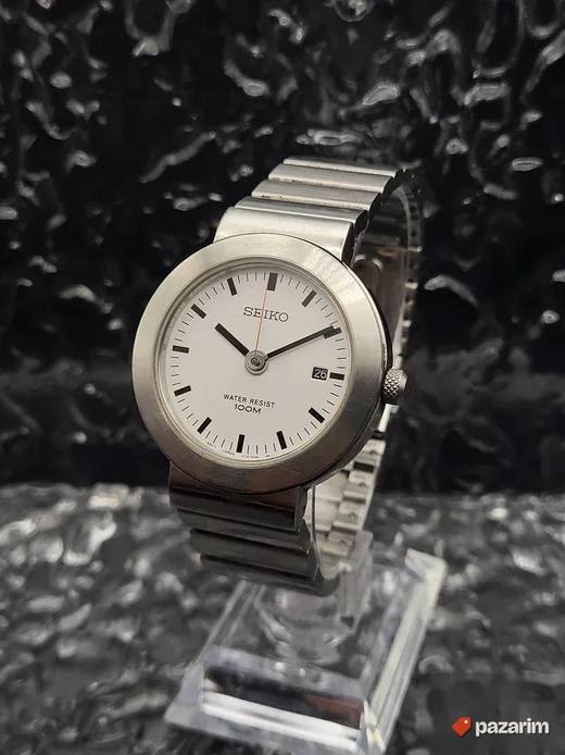 UNISEKS SEIKO V732-0N70 je klasičan kvarcni sa belim brojčan