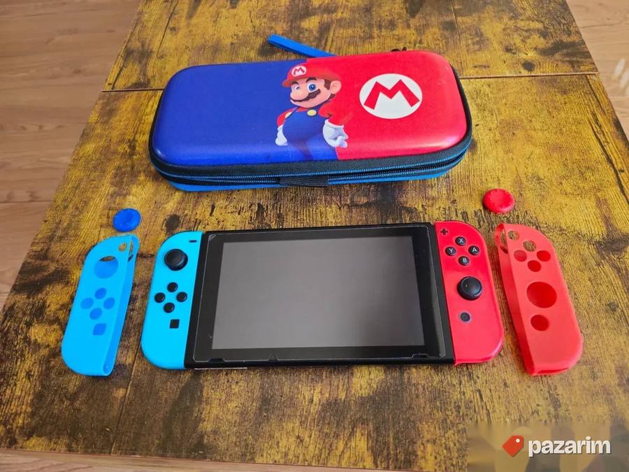 Nitendo Switch v2 + igrice i dodaci 5