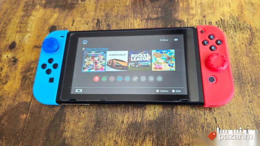 Nitendo Switch v2 + igrice i dodaci 6