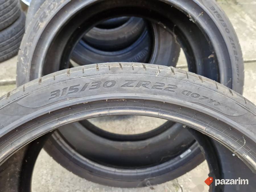 Dve odlicne letnje gume 22 ke 315-30/22 PIRELLI Dot0822 sa 5 6