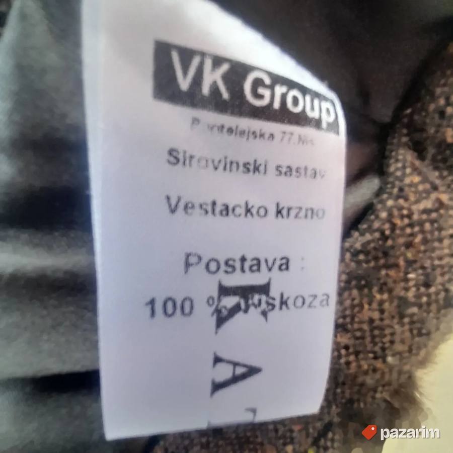 Kraći ženski prsluk od eko krzna vel 40 7